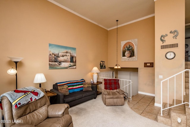 carpeted living area with tile patterned flooring, crown molding, visible vents, and baseboards