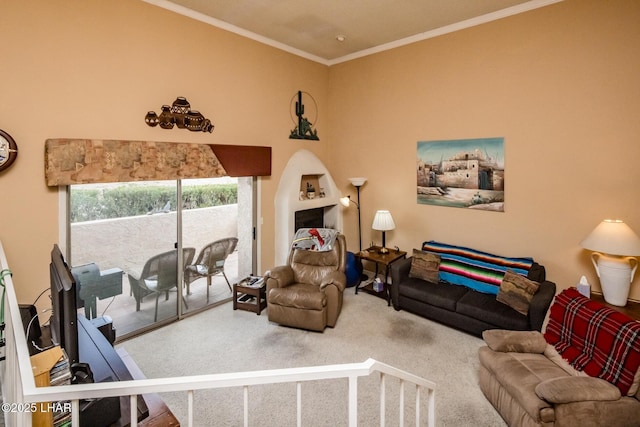 living area with carpet floors and ornamental molding