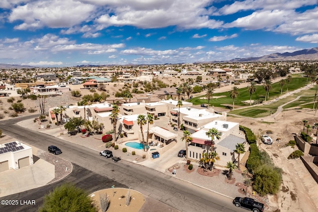 aerial view with a mountain view and a residential view