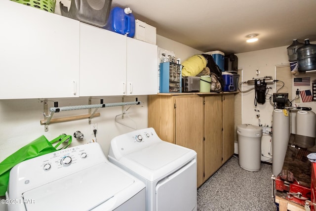 laundry room featuring cabinet space and independent washer and dryer