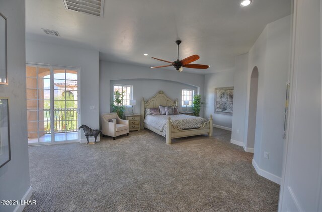 8551 River View Villas Dr Unit 15, Parker, AZ 85344 - carpeted bedroom featuring access to outside, recessed lighting, arched walkways, baseboards, and a ceiling fan