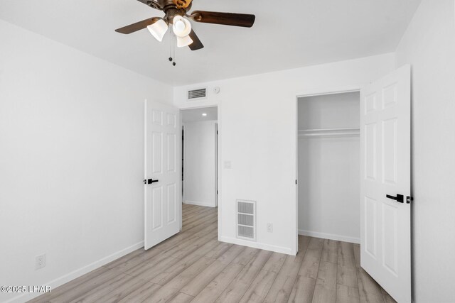 2870 Cisco Dr S, Lake Havasu City, AZ 86403 - unfurnished bedroom with light wood-style floors, a closet, and ceiling fan