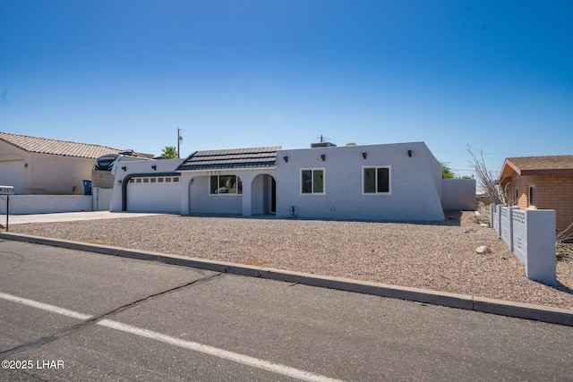2870 Cisco Dr S, Lake Havasu City, AZ 86403 - view of front of home featuring stucco siding, an attached garage, and driveway