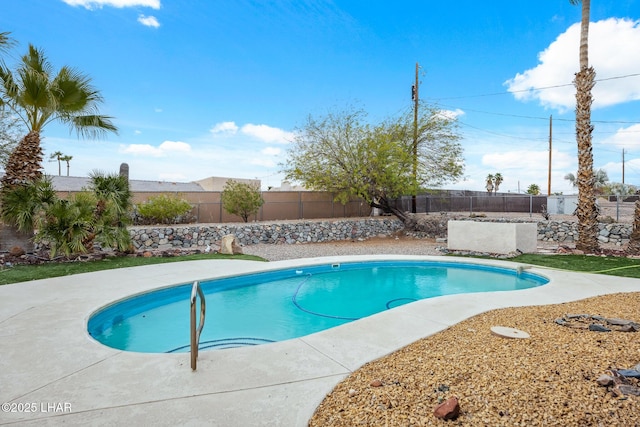 view of swimming pool with a fenced in pool, a patio area, and a fenced backyard