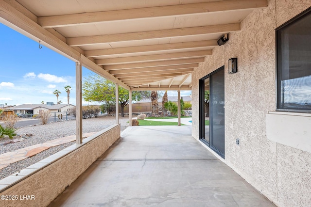 view of patio with fence