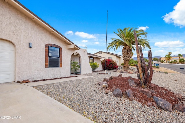 exterior space featuring an attached garage