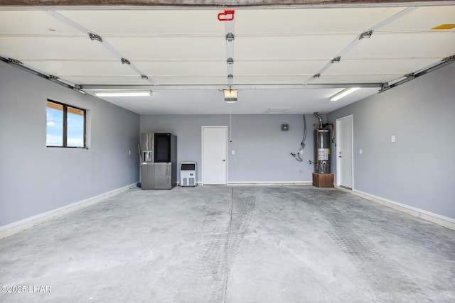 garage with a garage door opener, water heater, and baseboards