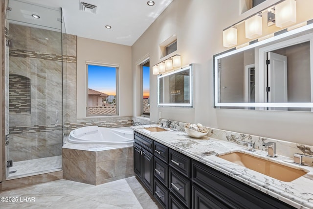 full bath with a bath, visible vents, a stall shower, and a sink