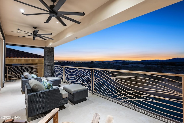 balcony featuring outdoor lounge area and a ceiling fan