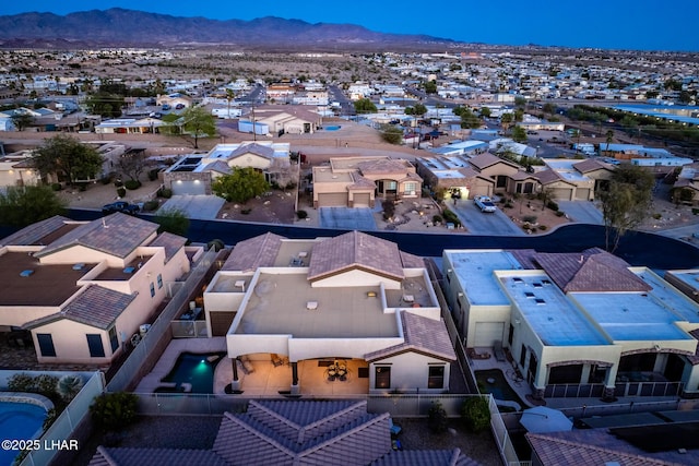 drone / aerial view featuring a mountain view and a residential view