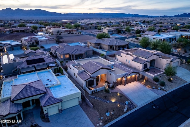 aerial view with a mountain view and a residential view