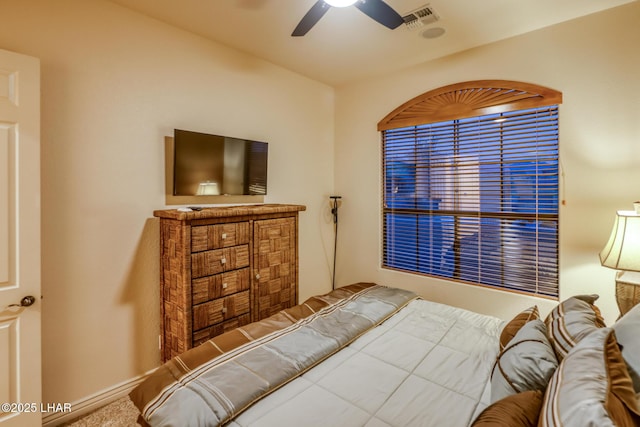 bedroom featuring visible vents and ceiling fan