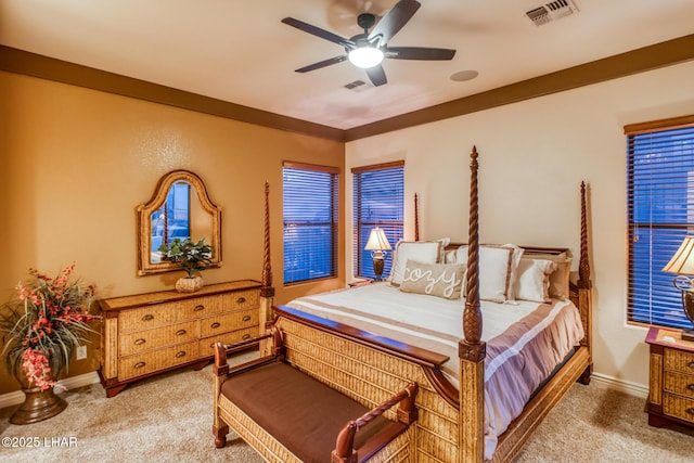 bedroom featuring visible vents, a ceiling fan, and carpet floors