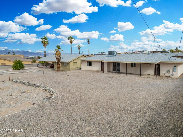 2780 Cisco Dr N, Lake Havasu City, AZ 86403 - back of house featuring fence, cooling unit, and a patio
