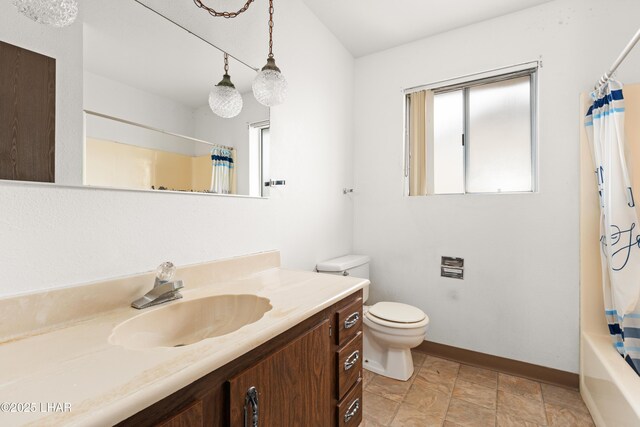 2780 Cisco Dr N, Lake Havasu City, AZ 86403 - full bathroom with toilet, shower / bathtub combination with curtain, vanity, and baseboards