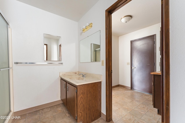 2780 Cisco Dr N, Lake Havasu City, AZ 86403 - full bath featuring a shower with shower door, vanity, and baseboards