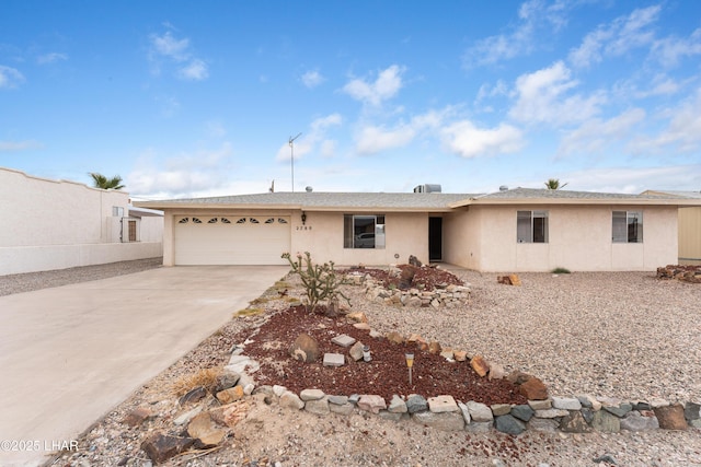 2780 Cisco Dr N, Lake Havasu City, AZ 86403 - ranch-style home featuring driveway, stucco siding, and an attached garage