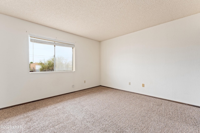 2780 Cisco Dr N, Lake Havasu City, AZ 86403 - carpeted spare room with baseboards and a textured ceiling