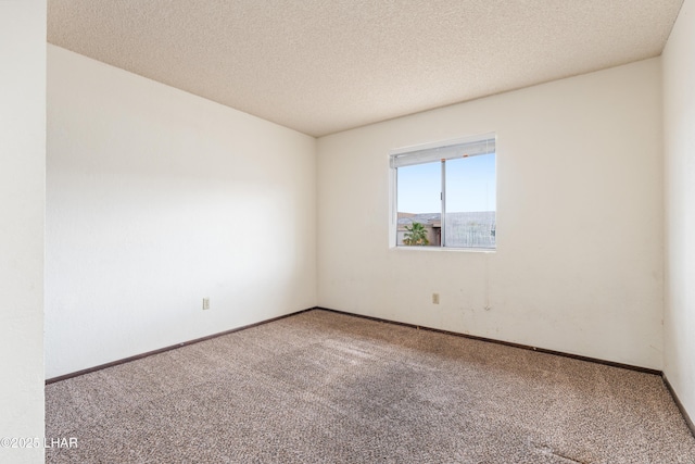 2780 Cisco Dr N, Lake Havasu City, AZ 86403 - carpeted empty room featuring a textured ceiling and baseboards