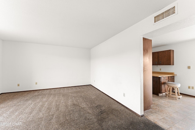 2780 Cisco Dr N, Lake Havasu City, AZ 86403 - unfurnished room with light carpet, visible vents, and baseboards