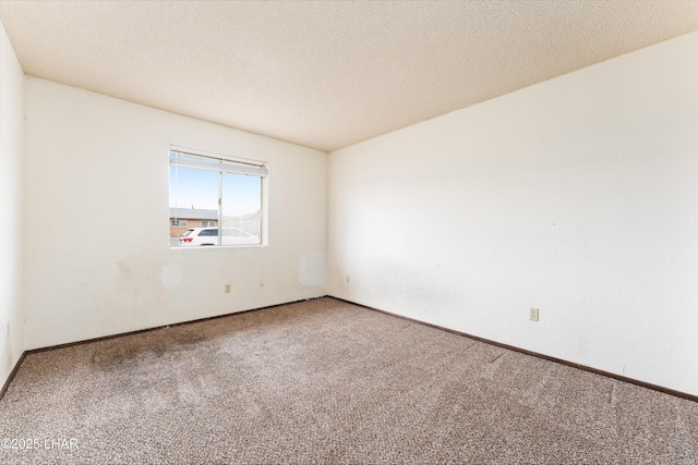 2780 Cisco Dr N, Lake Havasu City, AZ 86403 - carpeted spare room with a textured ceiling and baseboards