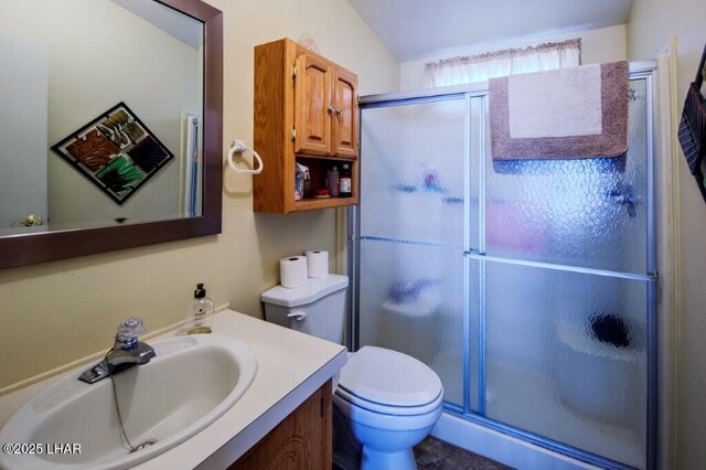 10056 Harbor View Rd, Parker, AZ 85344 - bathroom with a shower stall, vanity, and toilet