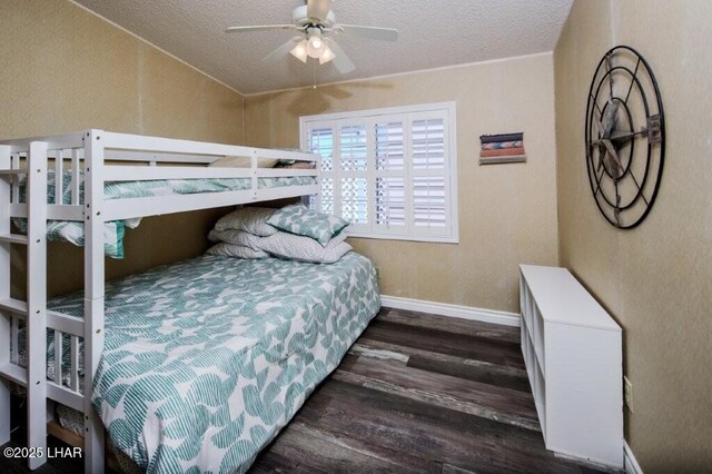 10056 Harbor View Rd, Parker, AZ 85344 - bedroom with wood finished floors, baseboards, and a textured ceiling