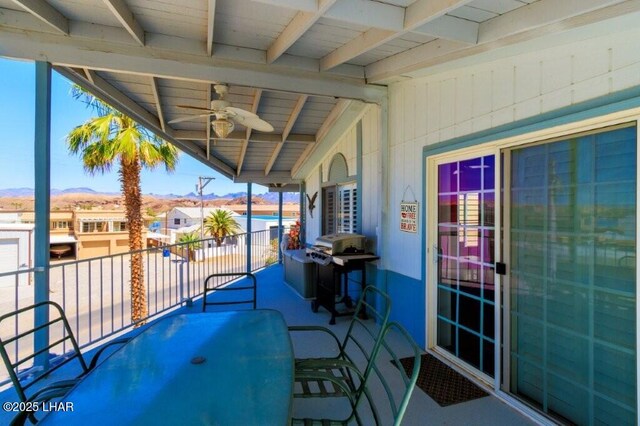 10056 Harbor View Rd, Parker, AZ 85344 - view of patio / terrace with ceiling fan, a balcony, a mountain view, and grilling area