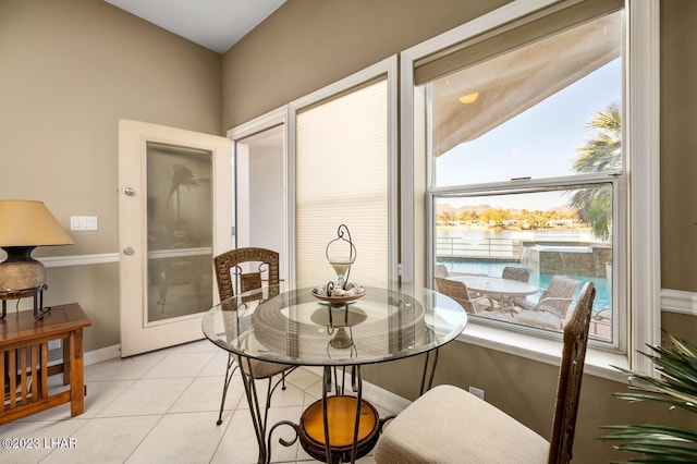 8480 Miraleste Shores Dr, Parker, AZ 85344 - dining space featuring light tile patterned flooring and baseboards