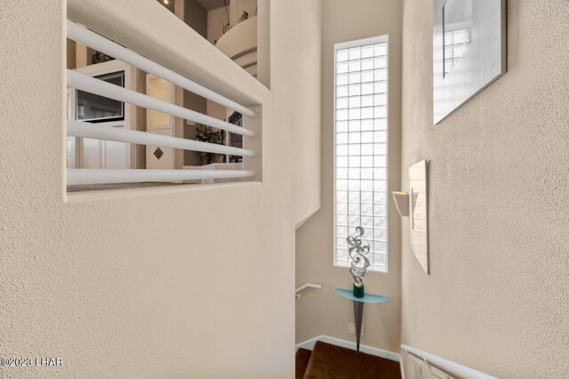 8480 Miraleste Shores Dr, Parker, AZ 85344 - staircase with a textured wall