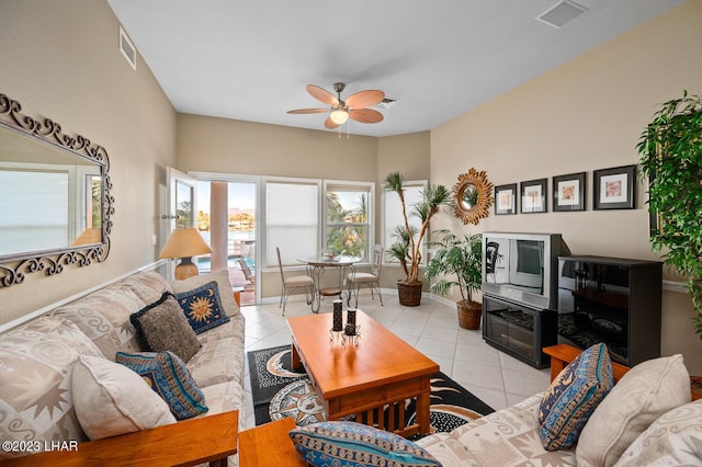 8480 Miraleste Shores Dr, Parker, AZ 85344 - living area featuring light tile patterned floors and a ceiling fan