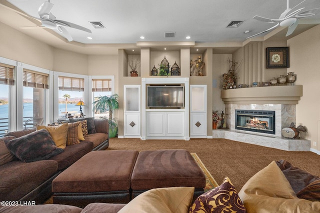 8480 Miraleste Shores Dr, Parker, AZ 85344 - living room featuring ceiling fan, carpet, a glass covered fireplace, and recessed lighting