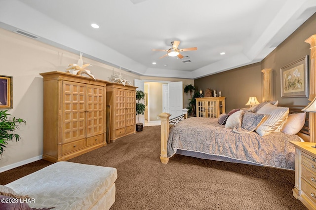 8480 Miraleste Shores Dr, Parker, AZ 85344 - carpeted bedroom with recessed lighting, a tray ceiling, and a ceiling fan