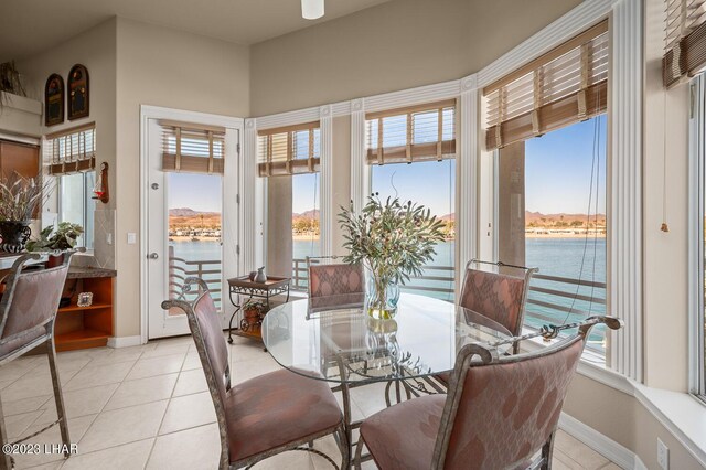 8480 Miraleste Shores Dr, Parker, AZ 85344 - dining room featuring a water view and light tile patterned floors