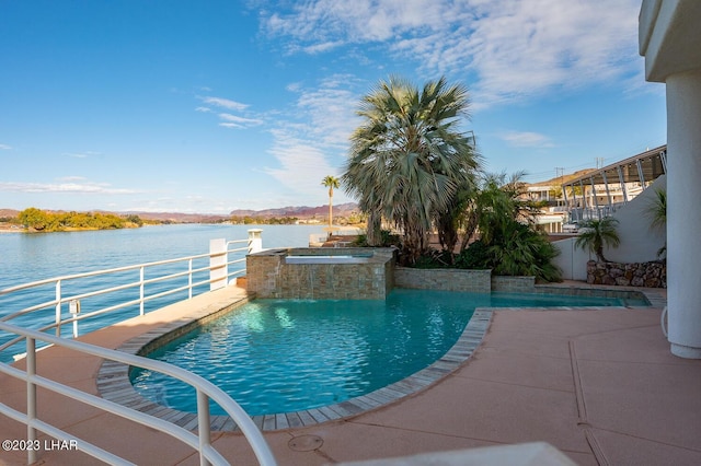8480 Miraleste Shores Dr, Parker, AZ 85344 - view of swimming pool with a water view and a pool with connected hot tub