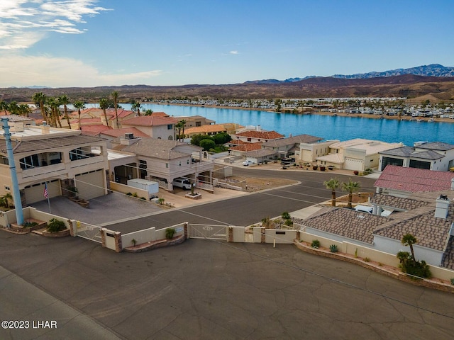 8480 Miraleste Shores Dr, Parker, AZ 85344 - aerial perspective of suburban area with a water and mountain view