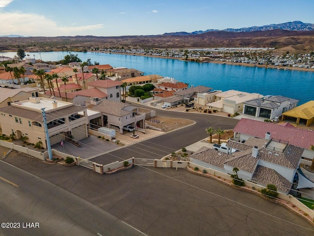 8480 Miraleste Shores Dr, Parker, AZ 85344 - aerial perspective of suburban area featuring a water and mountain view