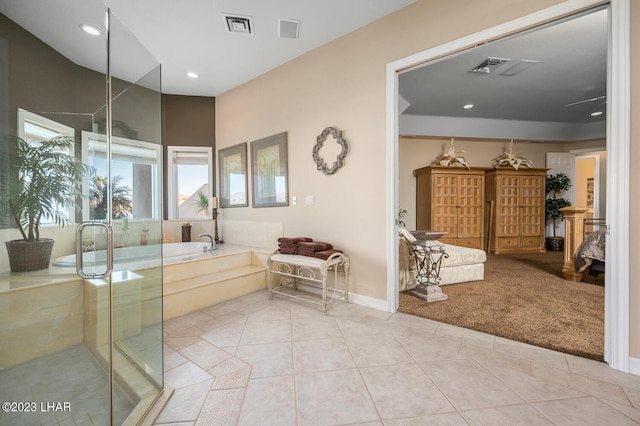 8480 Miraleste Shores Dr, Parker, AZ 85344 - full bathroom with a garden tub, tile patterned floors, a shower stall, and recessed lighting