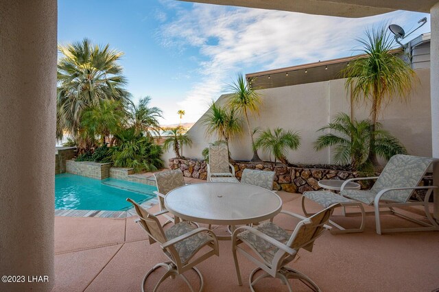 8480 Miraleste Shores Dr, Parker, AZ 85344 - view of swimming pool with a patio and outdoor dining area