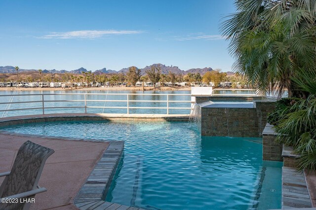 8480 Miraleste Shores Dr, Parker, AZ 85344 - outdoor pool featuring a water and mountain view