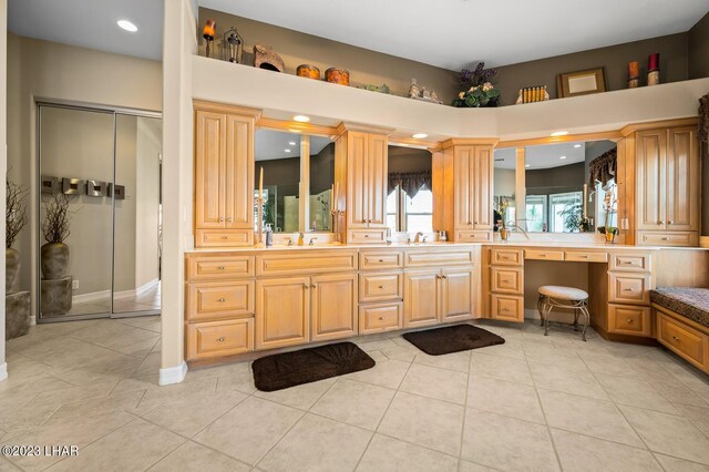 8480 Miraleste Shores Dr, Parker, AZ 85344 - full bathroom with double vanity, tile patterned floors, ornate columns, and recessed lighting