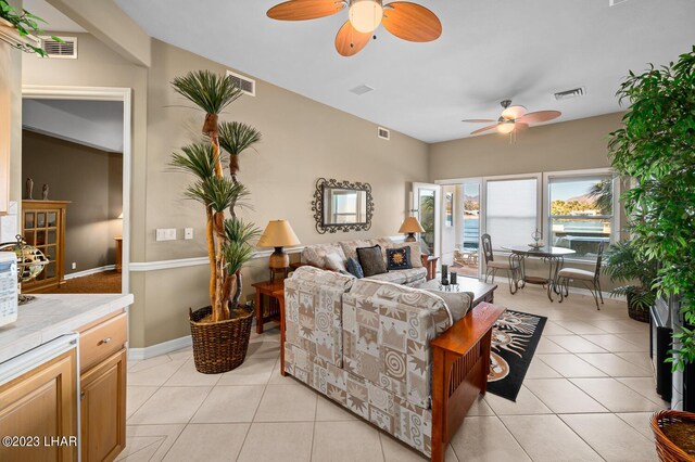 8480 Miraleste Shores Dr, Parker, AZ 85344 - living room with a ceiling fan and light tile patterned floors