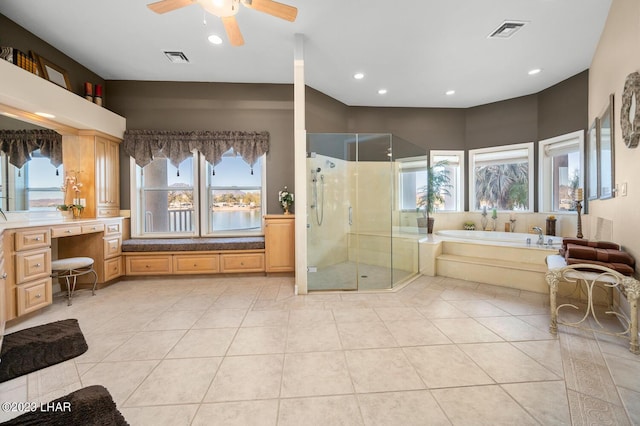 8480 Miraleste Shores Dr, Parker, AZ 85344 - full bath featuring a bath, a stall shower, tile patterned flooring, a ceiling fan, and recessed lighting
