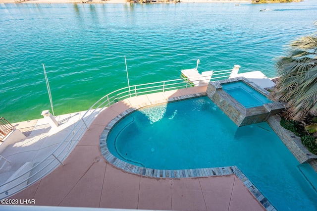 8480 Miraleste Shores Dr, Parker, AZ 85344 - view of swimming pool featuring a water view and a pool with connected hot tub