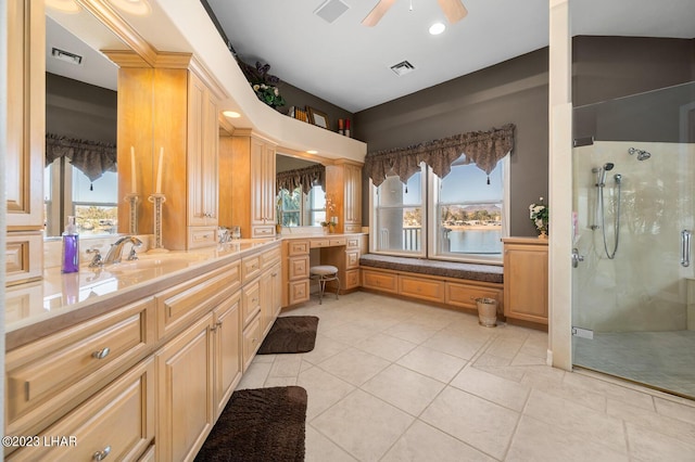 8480 Miraleste Shores Dr, Parker, AZ 85344 - full bath with a stall shower, double vanity, healthy amount of natural light, a ceiling fan, and recessed lighting