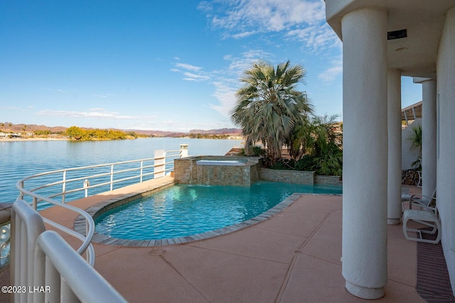 8480 Miraleste Shores Dr, Parker, AZ 85344 - view of pool featuring a water view and a pool with connected hot tub