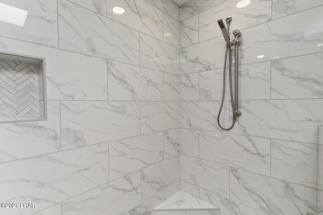 room details with a tile shower