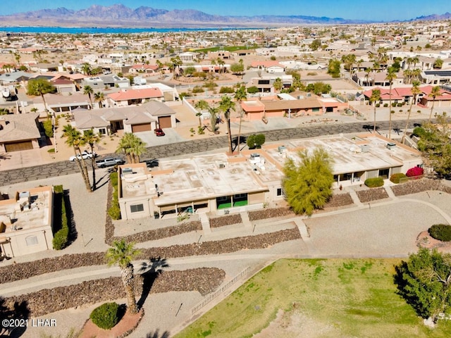 birds eye view of property with a residential view and a mountain view