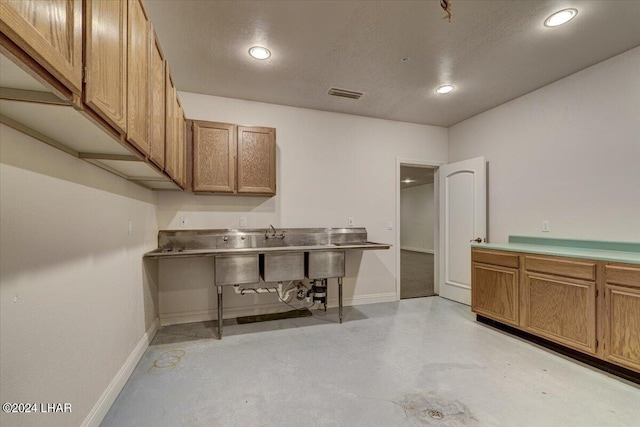 kitchen with a textured ceiling