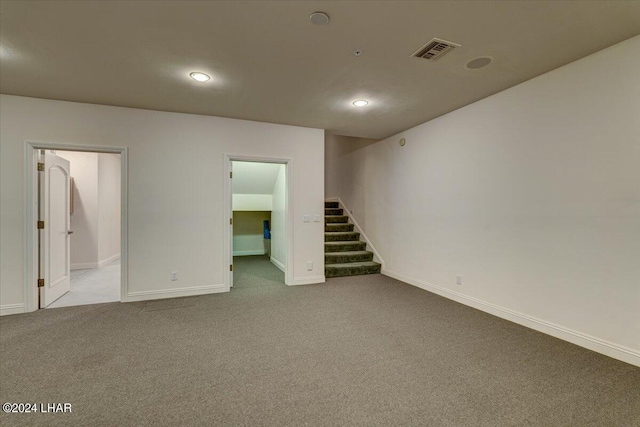 basement with light colored carpet